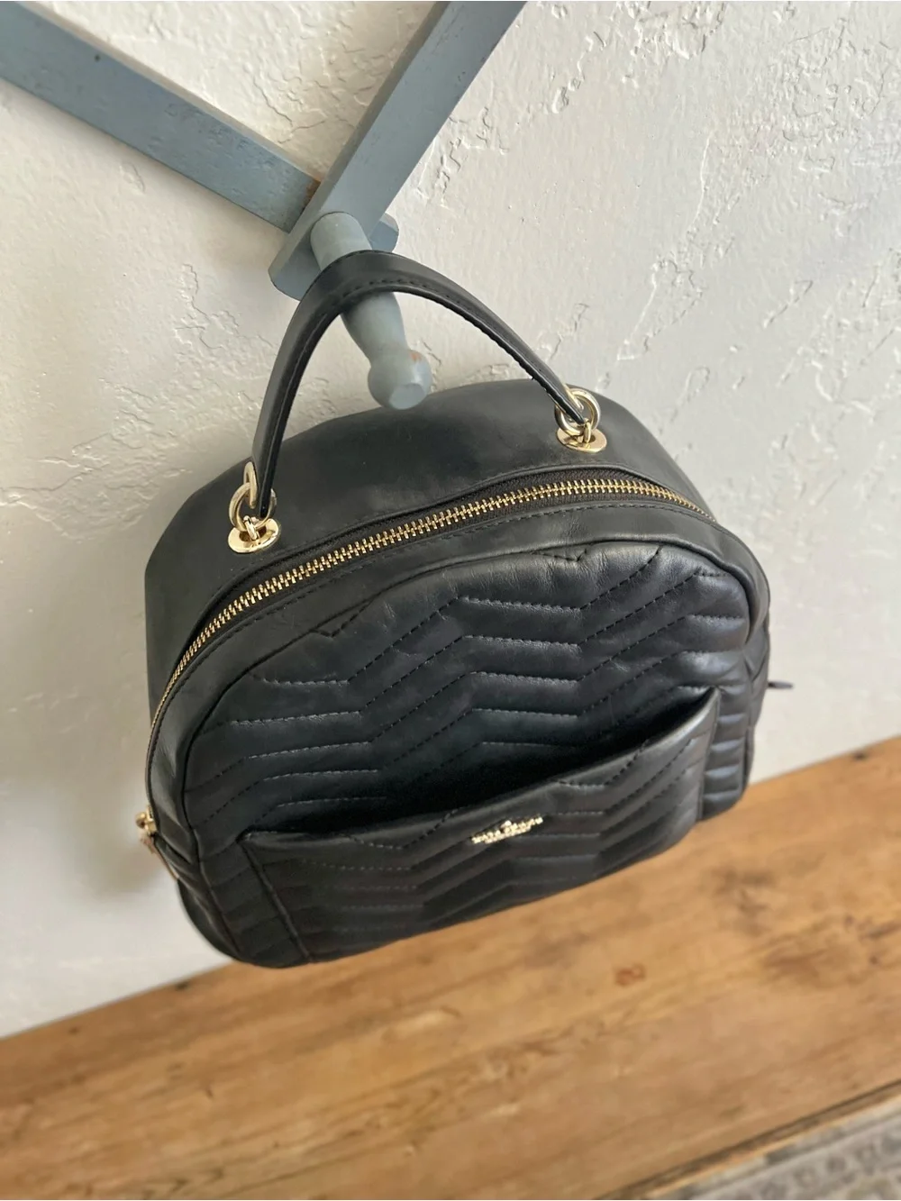 Kate Spade Quilted Black Leather Mini Backpack with Gold Accents